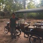 Ta Nei I burst out laughing when I see his fine dishes on the rikschaw in the middle of the jungle. We laugh together and he offers me an apple. Coffee no possible its for customer on bicycle....